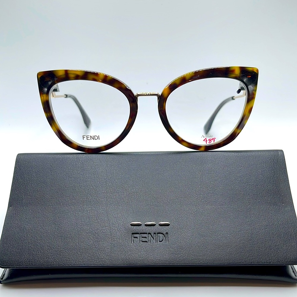 NWOT. Fendi cat eye tortoiseshell frames with gold and black arms.